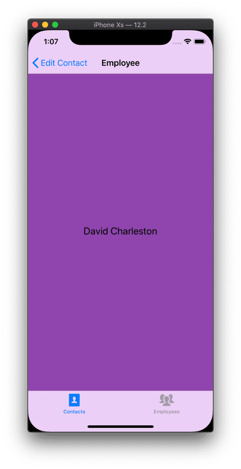Xcode screenshot of mobile screen that has heading "Employee" with a purple background beneath and the words "David Charleston" in black text. 